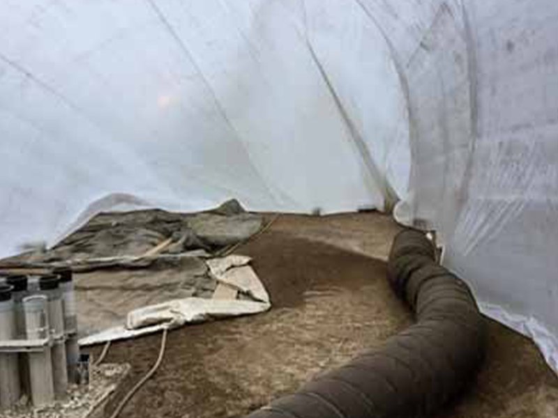 inside a tent being heated by temporary diesel heaters