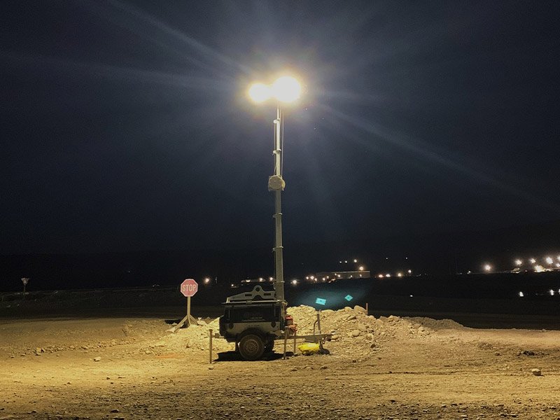 solar hybrid light tower on gravel construction site