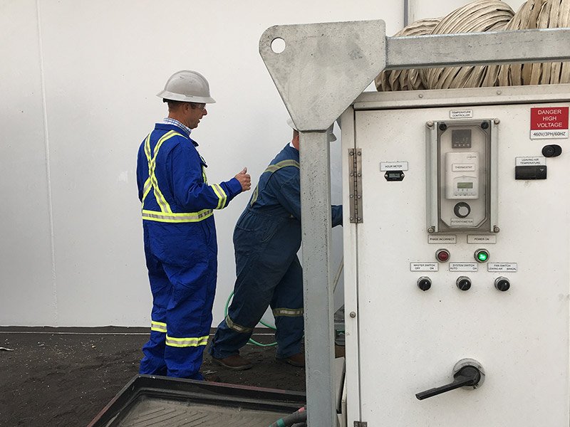Professionals inspecting equipment