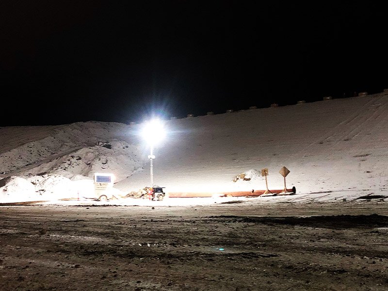 A light tower in a gravel pit